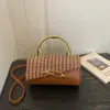 Bolso versátil de moda de nicho para hombro y bandolera, nuevo bolso cruzado al por mayor para mujer 2026, bolso tipo caja con bloques de color único, moderno