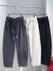 Pantalones casuales holgados de otoño e invierno, nuevo corte tridimensional, lijado, machete, pantalones casuales para hombre, tendencia, color liso, simples, rectos