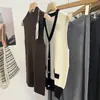 Shanghai Dan Nong Tejido/2026 Sin Costuras Lana Fina Otoño/Invierno Chaleco de Cuello Alto Traje de Suéter para Mujer Capa Base