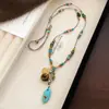Nuevo collar de clavícula de doble capa hecho a mano con cuentas estilo chino, diseño simple de cuentas de arroz, diseño personalizado de alta gama, adecuado para usar en capas en primavera y verano