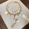 Collar Multicapa Estilo Resort Costero Perla Estrella de Mar Caracola Cadena de Clavícula de Nicho de Gama Alta Collar de Moda Retro para Mujer
