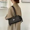 Bolso de mujer con patrón de rombos, nuevo modelo de otoño 2026, bolso de nicho de lujo ligero de alta gama para el día a día, bolso de hombro y axila de gran capacidad