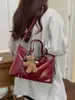 Bolsa Casual de Ombro Único para Mulheres 2026 Nova Obra Original Trabalho Escola Trajeto Couro Macio Grande Capacidade Bolsa Tote Simples