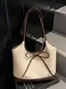 Bolsa de Ombro Moda Transfronteiriça Estilo Novo Primavera 2026 Ombro Único Textura Casual Moda Bolsa Tote Simples com Laço