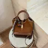 Bolso de mano pequeño de alta costura Ruien para mujer, nuevo y moderno bolso cubo de hombro y cruzado para ir al trabajo, otoño 2026