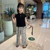 Traje de estilo chino nuevo para niñas Verano Nuevo Top Pintura a tinta Pantalones de pierna ancha para Niños Grandes Estilo Nacional Casual Conjunto de dos piezas a la moda