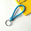 Llavero creativo de cuerda de cuero tejido a mano para pareja, llavero de coche, llavero al por mayor, colgante para bolso