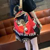 Mochila de Gran Capacidad con Estampado de Marca de Moda 2026 Nueva Moda Casual de Tela Oxford para Mujer Bolso de Viaje