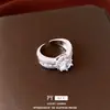 Anillo abierto redondo de circón bañado en oro real de 18k, sensación de lujo ligero de alta gama, joyería femenina moderna y versátil