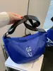 Bolsa de moda leve para mulheres 2023 nova verão popular bolsa de ombro em tecido Oxford design de nicho bolsa tiracolo de bolinho