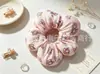 Gomas para moño infantiles con pequeños estampados florales, lindos accesorios para el cabello, al por mayor en stock