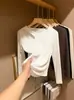 Versátil camiseta interior hueca para otoño e invierno, de cuello redondo para mujer, tejido de alta elasticidad, corte entallado que estiliza, diseño de hombro normal, color liso, manga larga