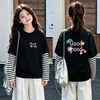 Camiseta de manga larga de algodón puro para niñas, top base elegante y moderno para niños, adecuada para primavera y otoño de 2026, con un diseño de imitación de dos piezas
