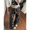 Carpa marea en stock sentido de diseño bordado en toalla cuchillo curvo jeans mujer caricatura divertida pantalones de pierna ancha pantalones holgados hasta el suelo moda