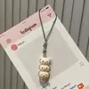 Lindo llavero de Rilakkuma de espino confitado, correa para teléfono de pareja de osos de dibujos animados súper adorable, accesorios para parejas y mejores amigos