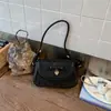 Bolsa de Ombro Pequena Quadrada Nova Tendência Primavera 2026 Estampada Moda Fofa para o Dia a Dia com Design Único de Laço Transversal