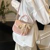 Bolsa de Mão Tecida de Entrada Elegante de Luxo de Nicho Feminina 2025 Nova Moda Versátil para Trabalho Ombro Transversal Sela
