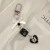 Estilo Doce Legal Y2K Laço de Amor Corrente para Celular Acessórios para Pendurar na Bolsa Headset com Cabeça CCD Porta-Moedas Pingente Chaveiro