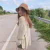 Estilo retro chic de Hong Kong, cárdigan de punto fino casual de corte holgado de manga larga para mujer, versátil y adelgazante, adecuado para el verano como chaqueta de protección solar