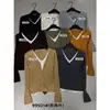 Solo Uno VI+ Otoño Mujer Estilo Francés Suave Hueco Versátil Adelgazante Patchwork Falso Dos Piezas Cárdigan de Punto 99501
