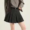 Saia curta plissada cinza estilo colegial para mulheres, saia de lã versátil em linha A que afina, cintura alta, outono e inverno 2026, saia JK