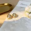 Pendientes de Botón Metálicos con Textura de Grano de Estrella de Ocho Puntas con Pedrería, de Lujo Ligero y Alta Gama, para Mujer, Personalidad de Nicho, Tendencia de Moda, Accesorios para Pendientes para Mujer