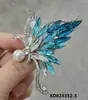 Broche de mariposa de simulación europea y americana de aleación estéreo diamante pin de alta gama textura retro de alta gama accesorios de ropa al por mayor