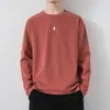 Camiseta de manga larga para hombre para primavera y otoño, estilo coreano, corte ajustado, color liso, cuello redondo, prenda base, moderna