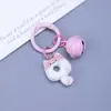 Clip de resorte Campanita Llavero de Gato Dibujo animado lindo Gato Donut Mochila Funda para auriculares Colgante de moda versátil