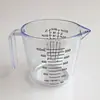 Suministro de fábrica taza medidora de plástico de 600 ml con escala taza medidora 600ML taza medidora transparente herramientas para hornear