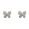 Pendientes Pequeños de Tachuela Mariposa de Circonita Japoneses Coreanos Exquisitos de Moda Dulces Versátiles Temperamento Lujo Ligero Sensación de Gama Alta Pendientes Súper Brillantes Venta al por Mayor