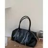 Bolso de mano grande para mujer de otoño e invierno transfronterizo 2026 nuevo bolso simple tipo almohada versátil para hombro y axila