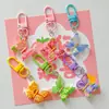 Chaveiro Pingente Pequena Flor Borboleta de Resina Acessórios DIY para Bolsas, Ganchos Pequenos de Porta, Mochilas, Decorações de Fones de Ouvido, Pequenos Presentes
