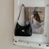 Bolso de Axila de Alta Apariencia a la Moda para Mujer 2026 Nuevo Estilo Chic Relajado Bolso de Hombro Cadena Tipo Dumpling para el Viaje al Trabajo