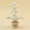 Venta al por mayor de fábrica Planta en maceta de lirios del valle tejida con hilo Adorno de escritorio para el hogar y la oficina Flor preservada artificial Souvenir Regalo