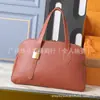 2025 Nuevo Bolso de Mano de Cuero Genuino para Mujer Bolso de Hombro de Alta Gama para Viajes Diarios Bolso Tote con Cierre Bolso de Mujer Moderno y Versátil