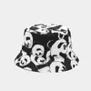 E-commerce transfronterizo venta caliente sombrero de pescador estampado con patrón de vaca nuevo para mujer sombrero de cubo de doble cara para hombre sombrero de sol de verano para exteriores