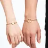 Pulsera de Acero Inoxidable Chapada en Oro de 18K con Cadena, Corazón Hueco, para Pareja, Popular Transfronteriza Europea y Americana, Simple y Versátil