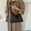 Bolso tote tejido texturizado para mujer, nuevo modelo 2026, bolso de hombro de nicho de lujo ligero de alta gama, bolso de mano simple y elegante para el día a día