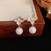 Aretes de borla de perlas florales estilo francés para mujer, únicos y elegantes, aretes de lujo ligero de alta gama, al por mayor