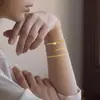 Amazon Transfronterizo 26 Letras Corazón Cuentas Doradas Pulsera de Cuentas Acero Inoxidable Clip de Papel Conjunto de Pulseras de Tres Capas Versátil