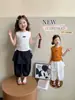 Conjunto de Dos Piezas de Chaleco de Verano para Niñas 2026 Verano Estilo Coreano Moderno Conjunto de Dos Piezas de Top sin Mangas y Pantalones de Linterna para Niños