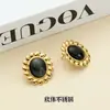 Moda europea y americana nicho pendientes vintage acero de titanio chapado en oro de 18 quilates temperamento geométrico piedra natural ojo de gato solar pendientes mujer