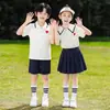 2026 Fotos Reais Roupas de Casal Verão Manga Curta Fantasias para Apresentação Estudantil Trajes de Formatura Uniformes de Turma Roupas de Apresentação Femininas e Masculinas