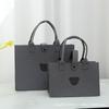 Bolsa de fieltro al por mayor de fábrica, bolsa tote, moda para ir al trabajo, compras, almacenamiento de librito rojo, bolso de mano, bolsa de regalo de mano