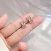 Pendientes de botón con orejas de conejo creativos distintivos estilo coreano, moda brillante, combinan con todo, nuevos pendientes de botón, regalo conmemorativo exquisito