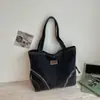 Bolso de mezclilla para mujer, nuevo bolso tote casual versátil de verano 2026 para la escuela y el trabajo, bolso de hombro de gran capacidad