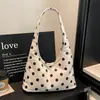 Bolso de mano de lunares estilo coreano, diseño de nicho, bolso de hombro de lujo ligero, bolso tote elegante y espacioso para ir al trabajo, adecuado para ventas transfronterizas