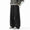 Pantalones de registro de algodón elástico de venta caliente para otoño, pantalones con remaches, nuevos pantalones de trabajo funcionales para hombre