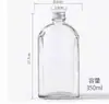 Venta de fábrica botella nueva para bebida de jugo botella de vino plana botella de café bebida fría botella de té de leche corte de luz hombro inclinado botella vacía de vidrio plano